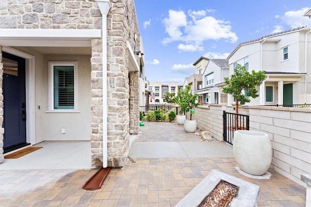 view of patio / terrace with a fire pit