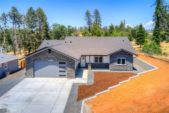 view of front of home with a garage