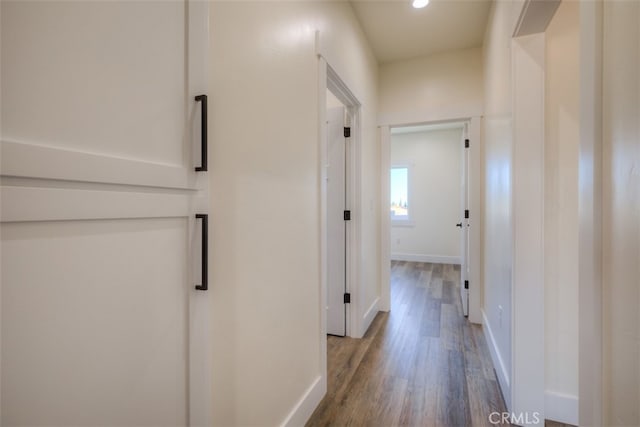 hallway featuring hardwood / wood-style floors