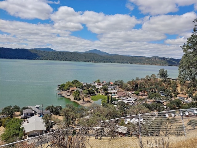 aerial view with a water and mountain view