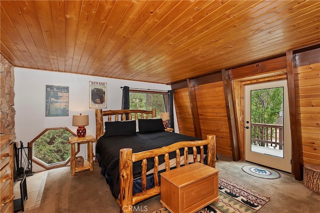 carpeted bedroom with access to exterior and wooden ceiling