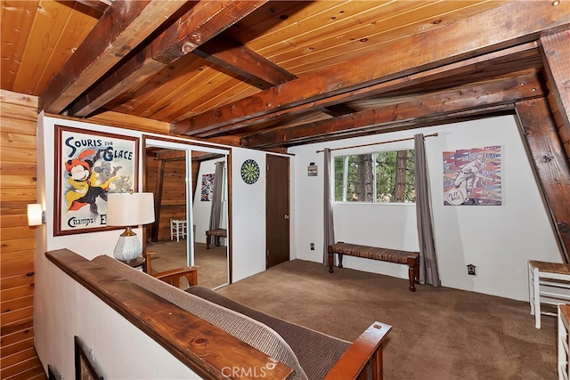 bedroom with carpet flooring, beamed ceiling, wooden ceiling, and wooden walls