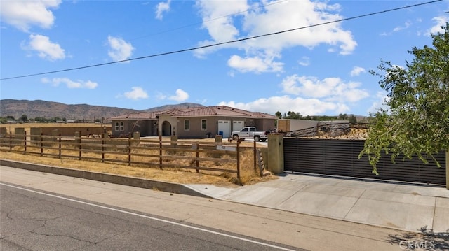 view of front of house with a mountain view