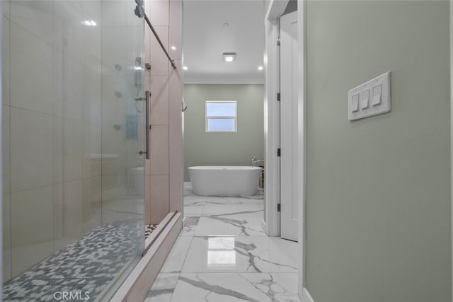 bathroom featuring plus walk in shower and ornamental molding