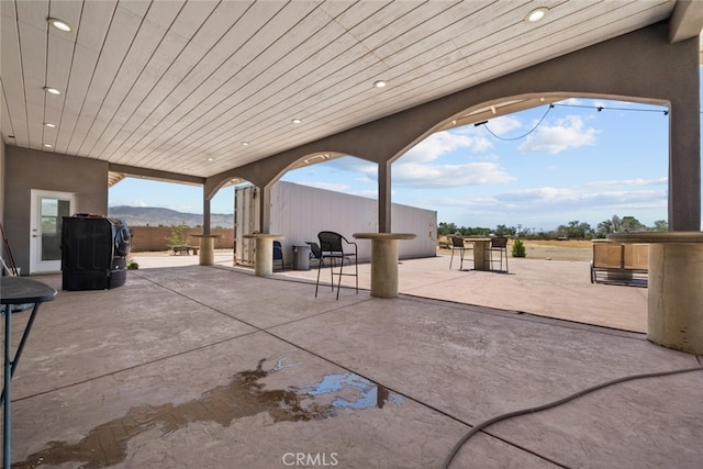 view of patio featuring a mountain view