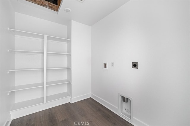 clothes washing area with washer hookup, dark hardwood / wood-style floors, and electric dryer hookup