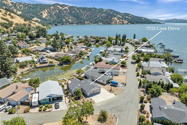 7722 Cora Dr, Lucerne, CA 95458 - aerial view of residential area with a water and mountain view