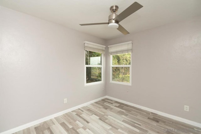 unfurnished room featuring ceiling fan and light wood-type flooring