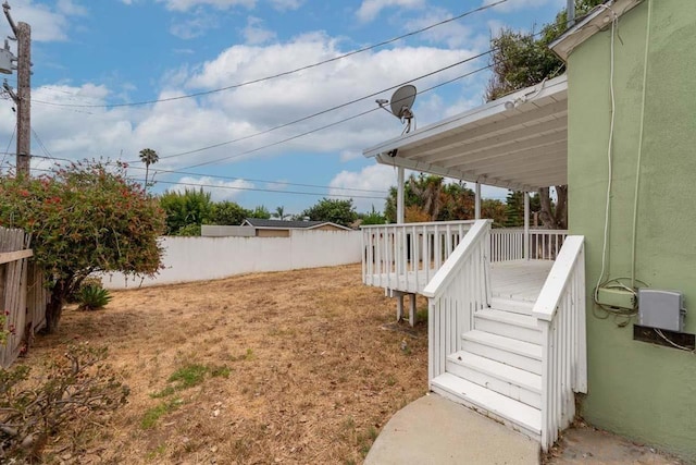 view of yard with a deck