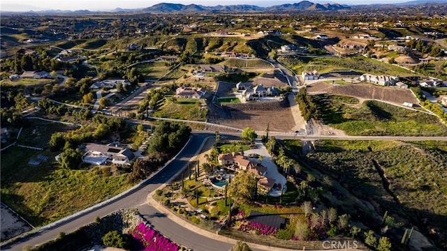 bird's eye view with a residential view and a mountain view