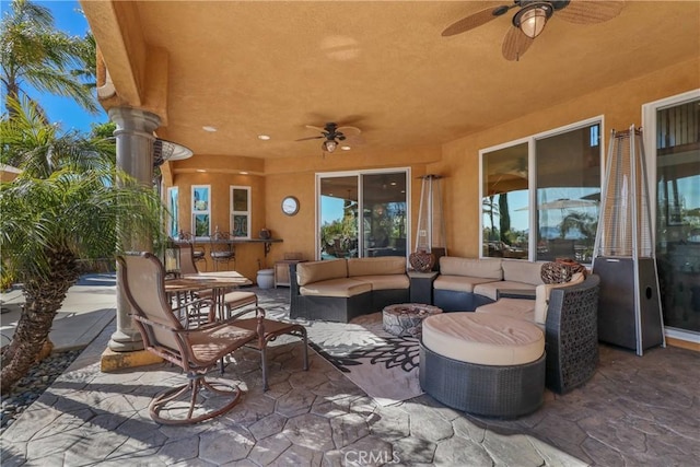 view of patio / terrace featuring an outdoor hangout area and a ceiling fan