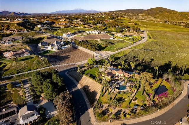 drone / aerial view with a residential view and a mountain view