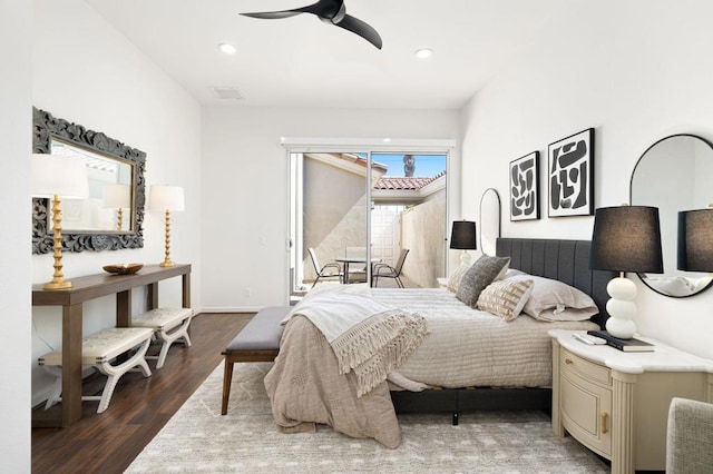 bedroom featuring ceiling fan and dark hardwood / wood-style floors