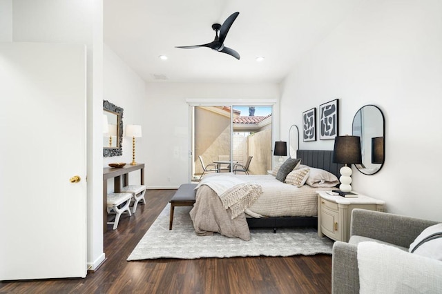 bedroom featuring ceiling fan and dark wood-type flooring