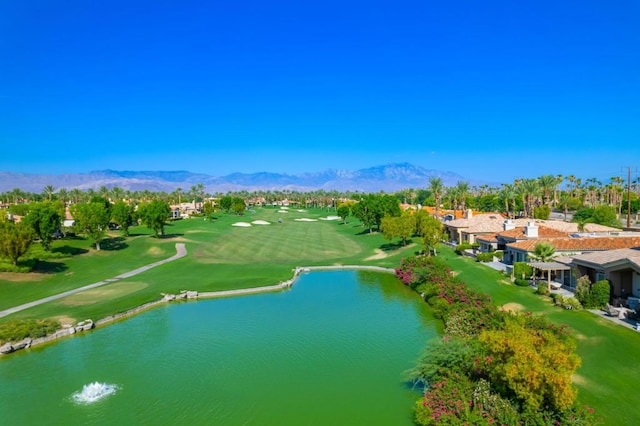 birds eye view of property featuring a water and mountain view