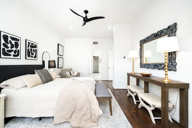 bedroom with ceiling fan and dark wood-type flooring