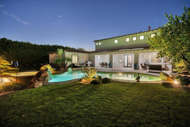 exterior space featuring outdoor lounge area, a yard, and a patio