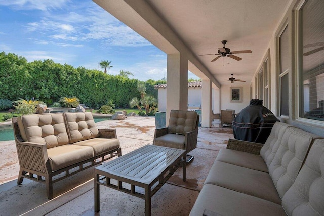 view of patio / terrace with ceiling fan and an outdoor hangout area