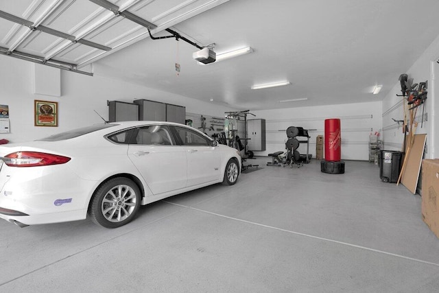 garage featuring a garage door opener