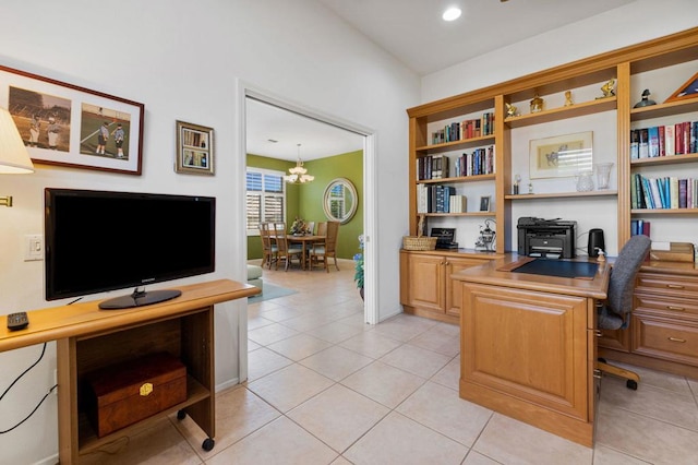 office area featuring an inviting chandelier and light tile patterned floors