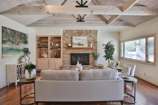 living room with vaulted ceiling with beams, wooden ceiling, wood-type flooring, and a brick fireplace