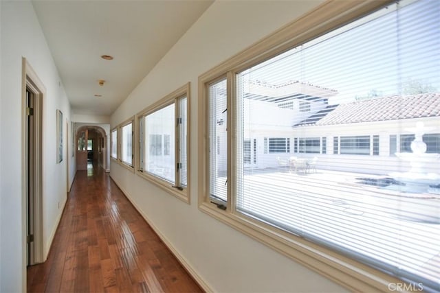 hallway featuring dark hardwood / wood-style floors