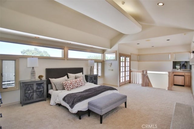 carpeted bedroom featuring high vaulted ceiling