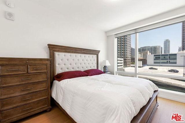 bedroom featuring light hardwood / wood-style flooring