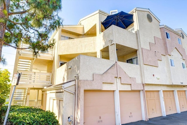 exterior space featuring community garages