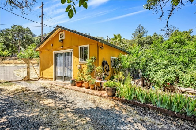 exterior space featuring an outbuilding