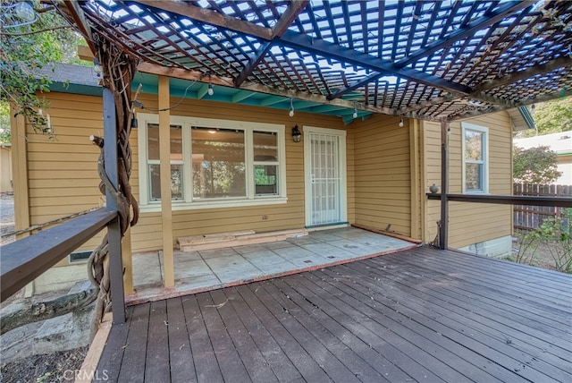 wooden terrace with a pergola