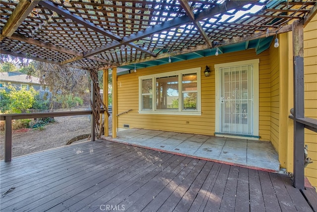 wooden deck with a pergola