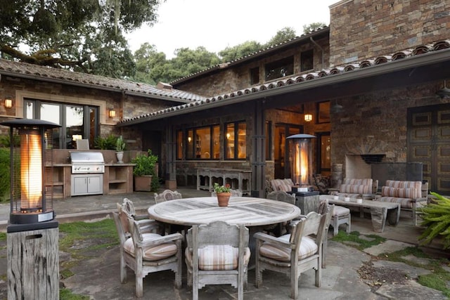 view of patio featuring a grill and outdoor lounge area