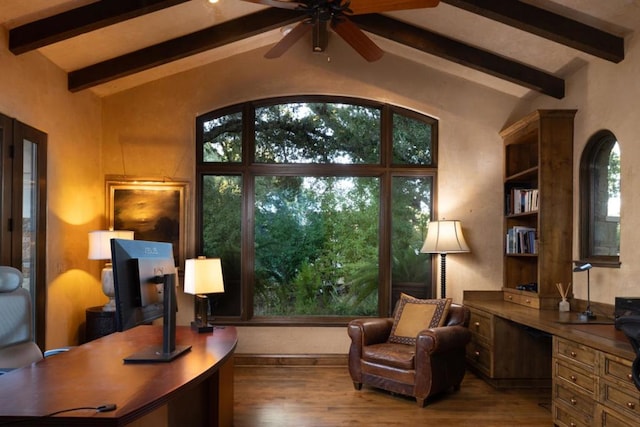 living area with lofted ceiling with beams, ceiling fan, and wood-type flooring