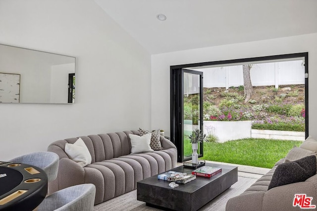 living room with vaulted ceiling