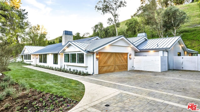 view of front of home with a garage