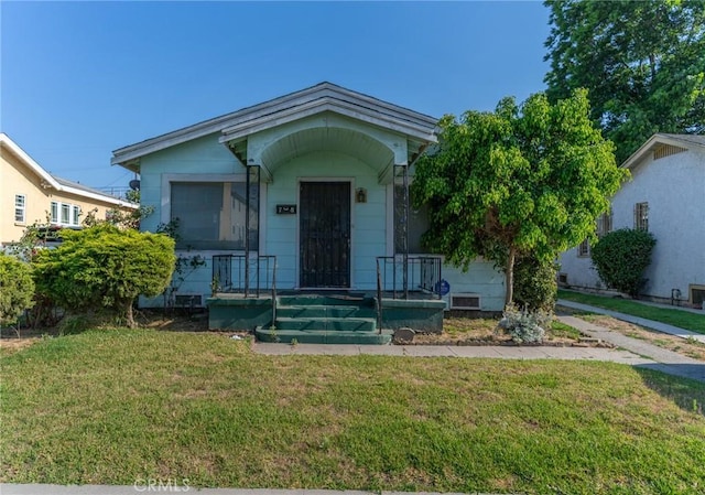 view of front of house featuring a front yard