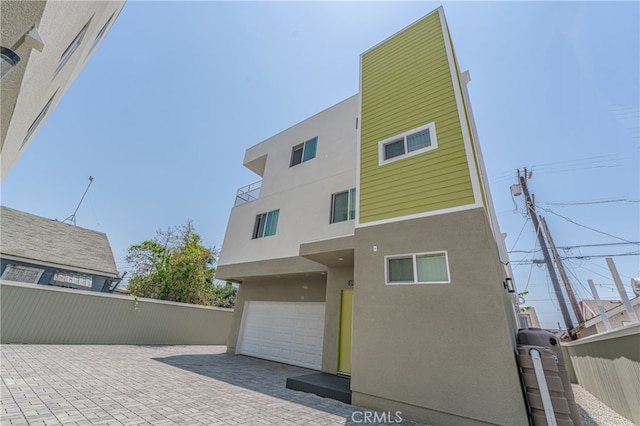 view of front of property featuring a garage