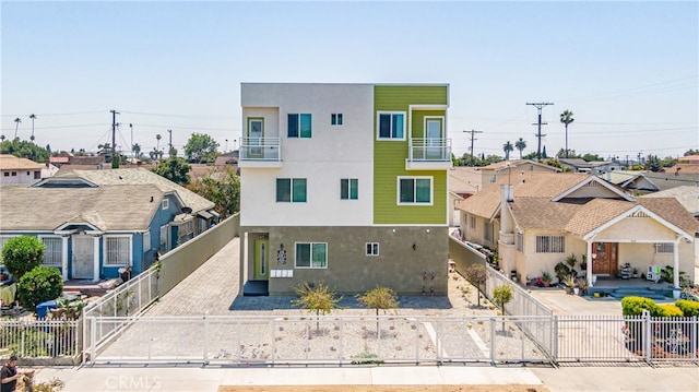 view of front of home with a balcony