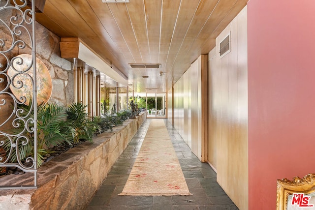 hall with wooden ceiling