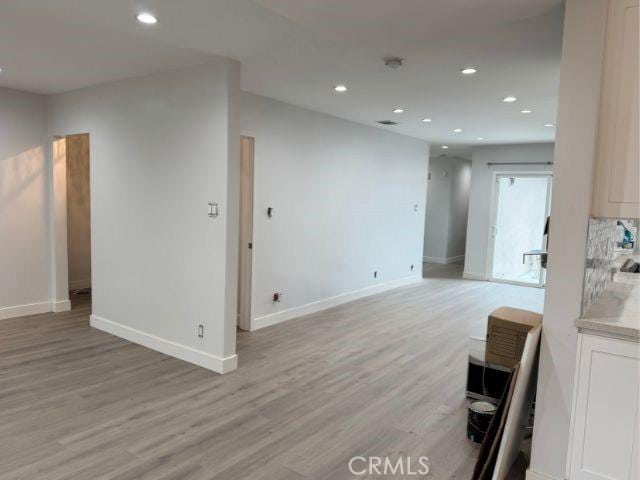 6053 Turnergrove Dr, Lakewood, CA 90713 - unfurnished room featuring light wood-style flooring, baseboards, and recessed lighting