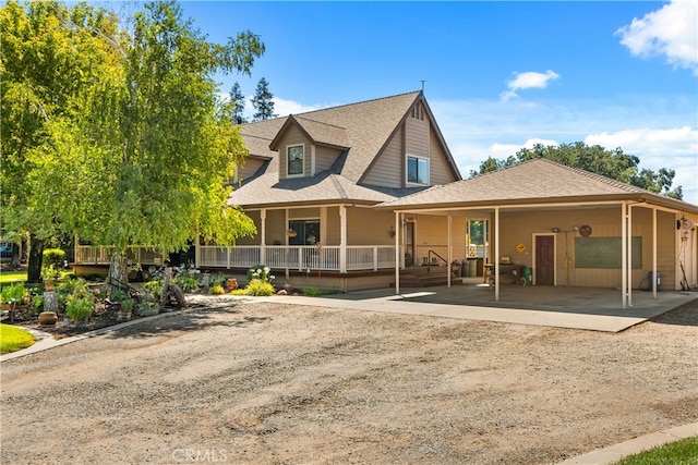 back of property featuring a porch