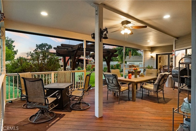 exterior space with ceiling fan and a grill