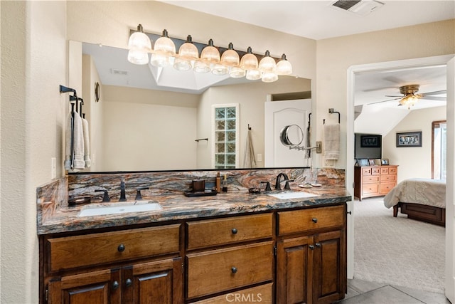 bathroom with vanity and ceiling fan