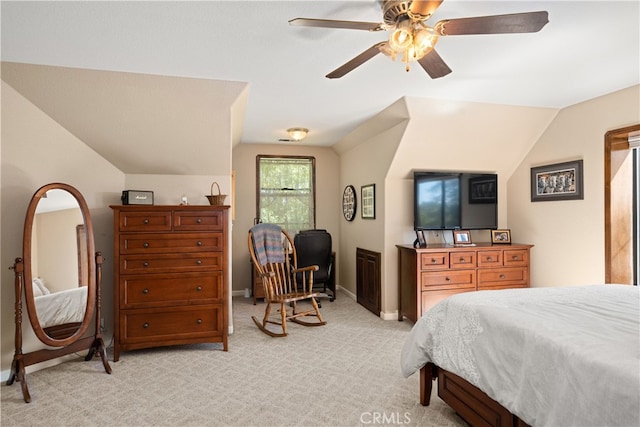 carpeted bedroom with lofted ceiling and ceiling fan