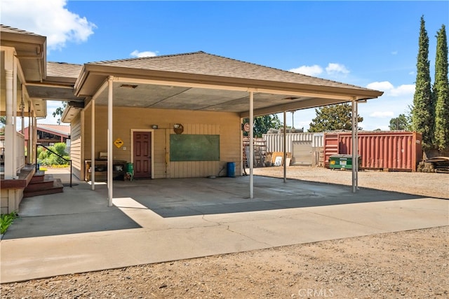 exterior space featuring a carport