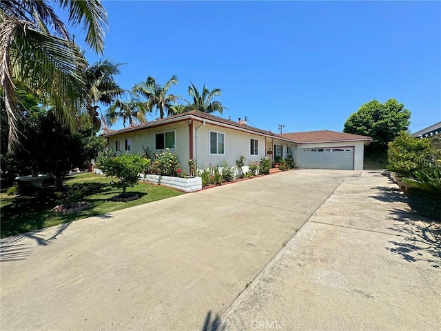 single story home with a garage