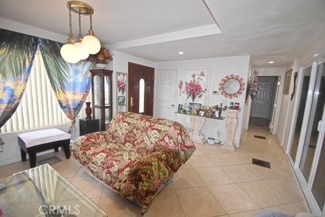 bedroom featuring light tile patterned floors