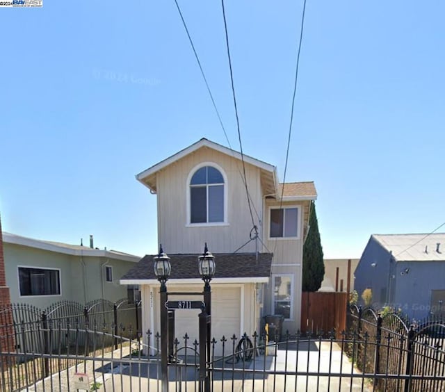 view of front of property featuring a garage