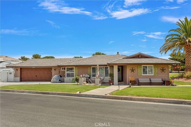 ranch-style home featuring a garage